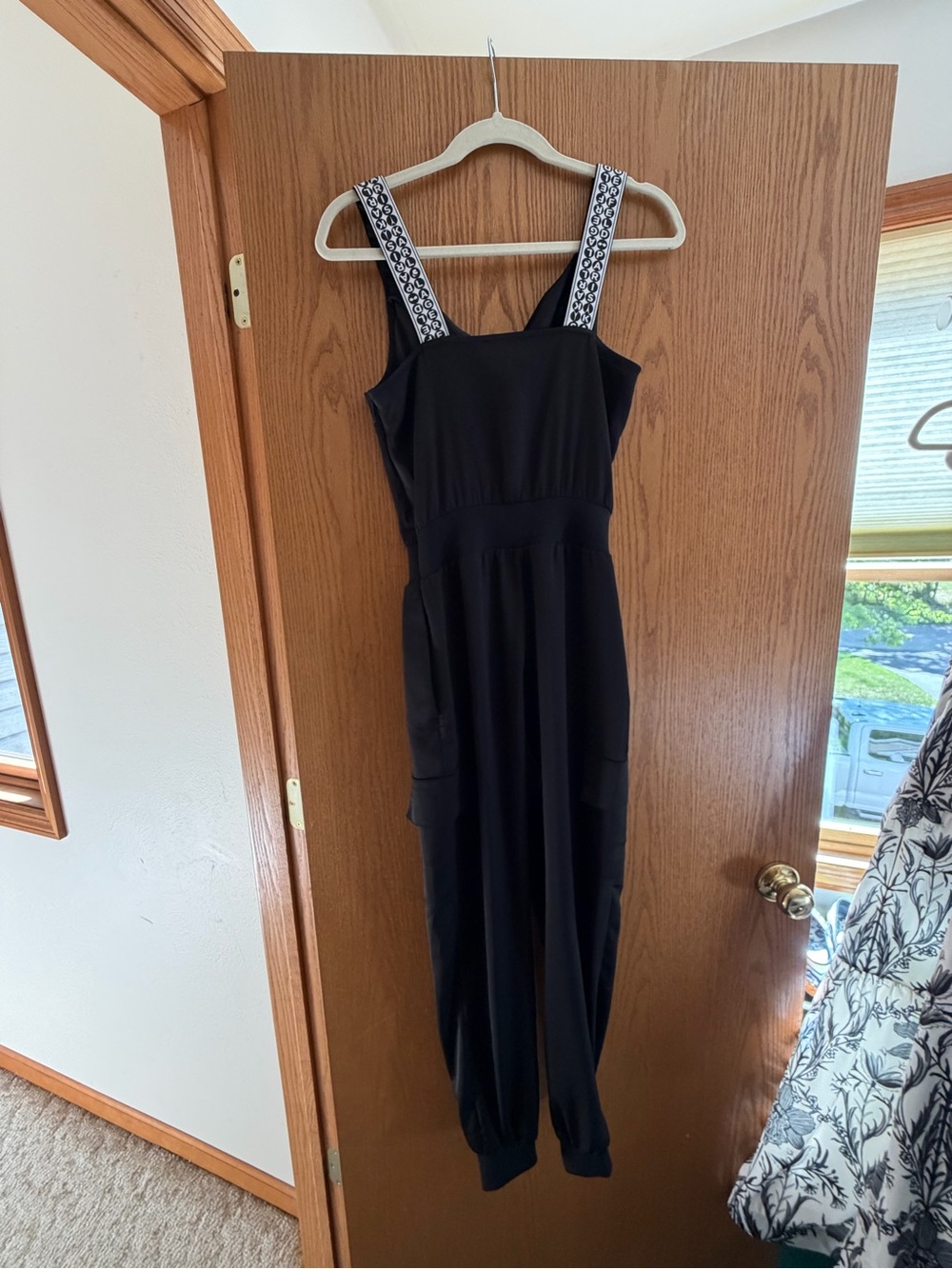 Karl Lagerfeld Black Jumpsuit with Contrasting White-Patterned Straps